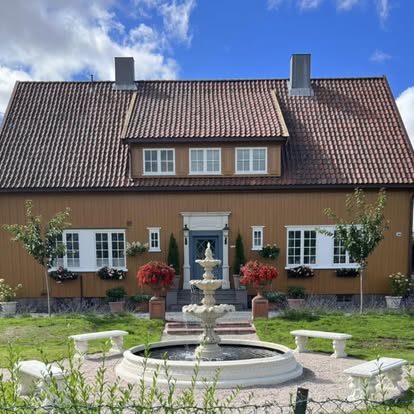 Utsyn over visningshagen til Legegaarden på Greåker